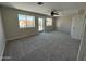 Bedroom with private balcony access and ceiling fan at 2158 N Yale --, Mesa, AZ 85213