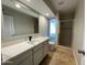 Updated bathroom with quartz countertop, modern vanity, and shower at 2158 N Yale --, Mesa, AZ 85213