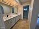 Elegant bathroom with double vanity and a large mirror at 2158 N Yale --, Mesa, AZ 85213