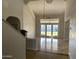 Bright living room with tile floors and access to backyard at 2158 N Yale --, Mesa, AZ 85213
