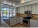 Modern kitchen with granite countertops and stainless steel appliances at 2158 N Yale --, Mesa, AZ 85213