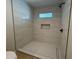 Large walk-in shower with modern tile and fixtures at 2158 N Yale --, Mesa, AZ 85213