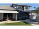 House exterior showcasing a spiral staircase, patio, and artificial turf at 2158 N Yale --, Mesa, AZ 85213