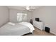 Spacious bedroom with a queen bed, dresser, and ceiling fan at 3771 E Hazeltine Way, Chandler, AZ 85249
