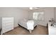 Comfortable bedroom with a double bed, dresser, and ceiling fan at 3771 E Hazeltine Way, Chandler, AZ 85249