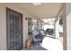 Covered patio with seating area and wrought iron door at 3771 E Hazeltine Way, Chandler, AZ 85249