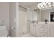 Clean bathroom with double vanity, shower, and updated fixtures at 3771 E Hazeltine Way, Chandler, AZ 85249
