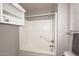 Bathroom with shower/tub combo and overhead shelving at 3771 E Hazeltine Way, Chandler, AZ 85249