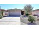 Single-story house with attached garage and desert landscaping at 3771 E Hazeltine Way, Chandler, AZ 85249