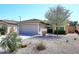 Charming single-story home with a two-car garage and well-manicured front yard at 3771 E Hazeltine Way, Chandler, AZ 85249