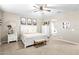 Bright bedroom featuring a king-size bed and en-suite bathroom access at 11876 W Nadine Way, Peoria, AZ 85383