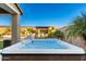 Modern hot tub nestled in a beautifully landscaped backyard at 11876 W Nadine Way, Peoria, AZ 85383