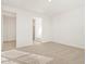 Bright bedroom with carpeting and ensuite bathroom access at 37517 W San Clemente St, Maricopa, AZ 85138