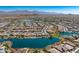 Large community overview, showcasing a lake and mountain views at 16561 S 179Th Ln, Goodyear, AZ 85338