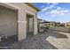 Covered patio with seating area, pavers and a view of the surrounding neighborhood at 16561 S 179Th Ln, Goodyear, AZ 85338