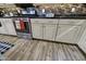 Modern kitchen with stainless steel appliances and light colored cabinets at 16561 S 179Th Ln, Goodyear, AZ 85338