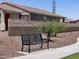 Community park with a bench and walkway at 41740 W Sonoran Trl, Maricopa, AZ 85138