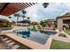 Relaxing pool area with swim-up bar and comfortable seating at 21423 S 147Th St, Gilbert, AZ 85298