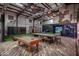 Game room with pool table, golf simulator, and fitness area at 21423 S 147Th St, Gilbert, AZ 85298