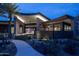 Contemporary home with a courtyard and water feature at 21423 S 147Th St, Gilbert, AZ 85298