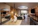 Unique bedroom with a circular couch and gold swing at 21423 S 147Th St, Gilbert, AZ 85298