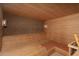 Modern sauna with wood interior and a comfortable bench at 21423 S 147Th St, Gilbert, AZ 85298