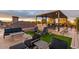 Spacious rooftop patio with fire pit and comfortable seating at 21423 S 147Th St, Gilbert, AZ 85298