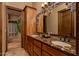 Double vanity bathroom with marble countertops at 21423 S 147Th St, Gilbert, AZ 85298
