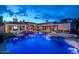 Stunning pool and spa area with custom lighting and landscaping at 21423 S 147Th St, Gilbert, AZ 85298