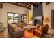 Spacious living room with fireplace and large windows at 21423 S 147Th St, Gilbert, AZ 85298