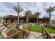 Contemporary home with landscaped yard and circular walkway at 21423 S 147Th St, Gilbert, AZ 85298