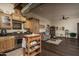 Rustic kitchen with wooden cabinets and modern appliances at 21423 S 147Th St, Gilbert, AZ 85298