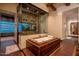 Luxury bathroom with a soaking tub and a glass-enclosed shower at 21423 S 147Th St, Gilbert, AZ 85298