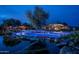 Luminous pond with a unique pathway and landscaping at 21423 S 147Th St, Gilbert, AZ 85298