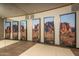 Home gym with scenic mountain mural and mirrors at 21423 S 147Th St, Gilbert, AZ 85298