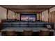 Home theater with a large screen and comfortable seating at 21423 S 147Th St, Gilbert, AZ 85298