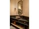Unique powder room with a rustic sink and industrial-style vanity at 21423 S 147Th St, Gilbert, AZ 85298