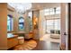 Luxury closet with a vanity and built-in shelving at 21423 S 147Th St, Gilbert, AZ 85298