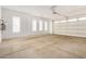 Attached garage with overhead door and window at 5309 N 148Th Ave, Litchfield Park, AZ 85340