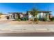 Single-story home with landscaped yard and two-car garage at 5309 N 148Th Ave, Litchfield Park, AZ 85340
