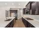 Modern kitchen with stainless steel appliances and gas cooktop at 5309 N 148Th Ave, Litchfield Park, AZ 85340