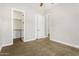 Spacious bedroom with walk-in closet and neutral decor at 5309 N 148Th Ave, Litchfield Park, AZ 85340