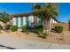Single-story home with landscaped yard and two-car garage at 5309 N 148Th Ave, Litchfield Park, AZ 85340