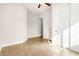 Bright hallway with tile flooring and neutral walls at 5309 N 148Th Ave, Litchfield Park, AZ 85340