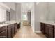 Large bathroom boasts double vanity, soaking tub, and separate shower at 5309 N 148Th Ave, Litchfield Park, AZ 85340