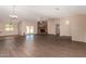 Large living area featuring a stone fireplace and lots of natural light at 6034 E Hillview St, Mesa, AZ 85205