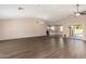 Open floor plan connecting living room to kitchen and patio at 6034 E Hillview St, Mesa, AZ 85205