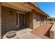 Inviting front entry with decorative door and landscaping at 6034 E Hillview St, Mesa, AZ 85205
