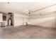 Spacious garage with ample storage and workbench at 6034 E Hillview St, Mesa, AZ 85205