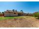Large backyard with grassy area and partially cleared lot at 6034 E Hillview St, Mesa, AZ 85205